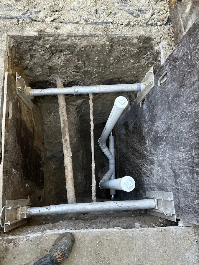 Experienced plumber completing Drain Cleaning work in East Point